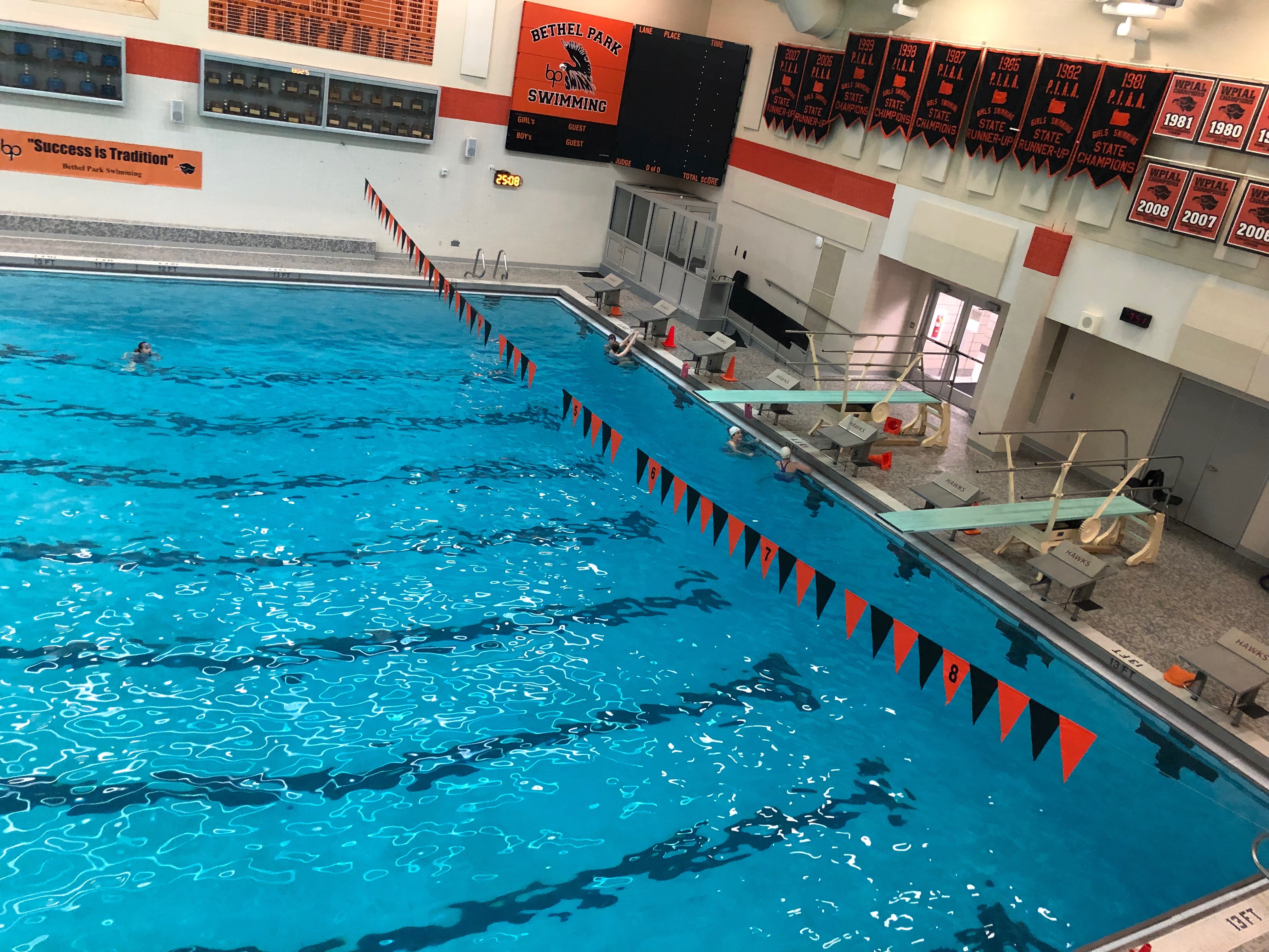 Deep end with two diving boards at BP high school.